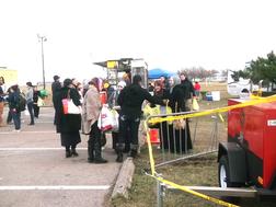 Safiyya and Marie-France distributing food to survivors in Staten Island