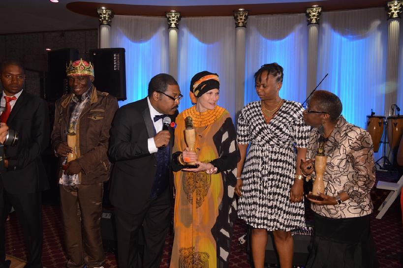 Safiyya Sarkin, the Excutive Director of Women Beyond Survival, accepting the Award from Smith Georges, the President of the Haitian Heritage Awards