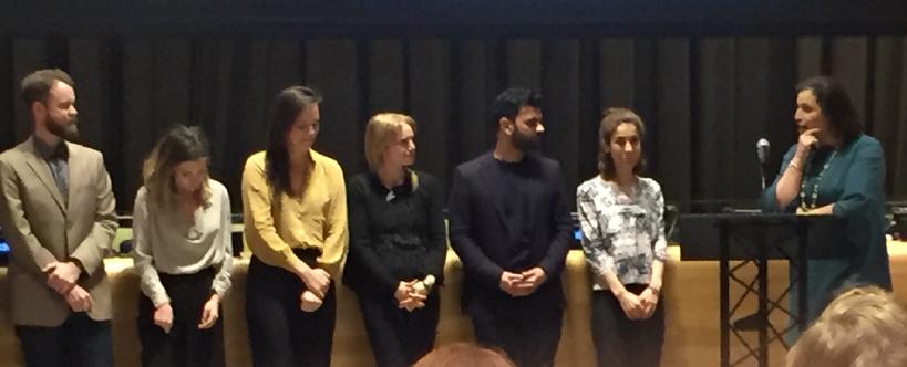 Standing at the pulpit is Simone Monasbian, the Head of UNODC and one of the sponsors; next to her is Nadia Murad, her fiance, and the writers and producers of the film.